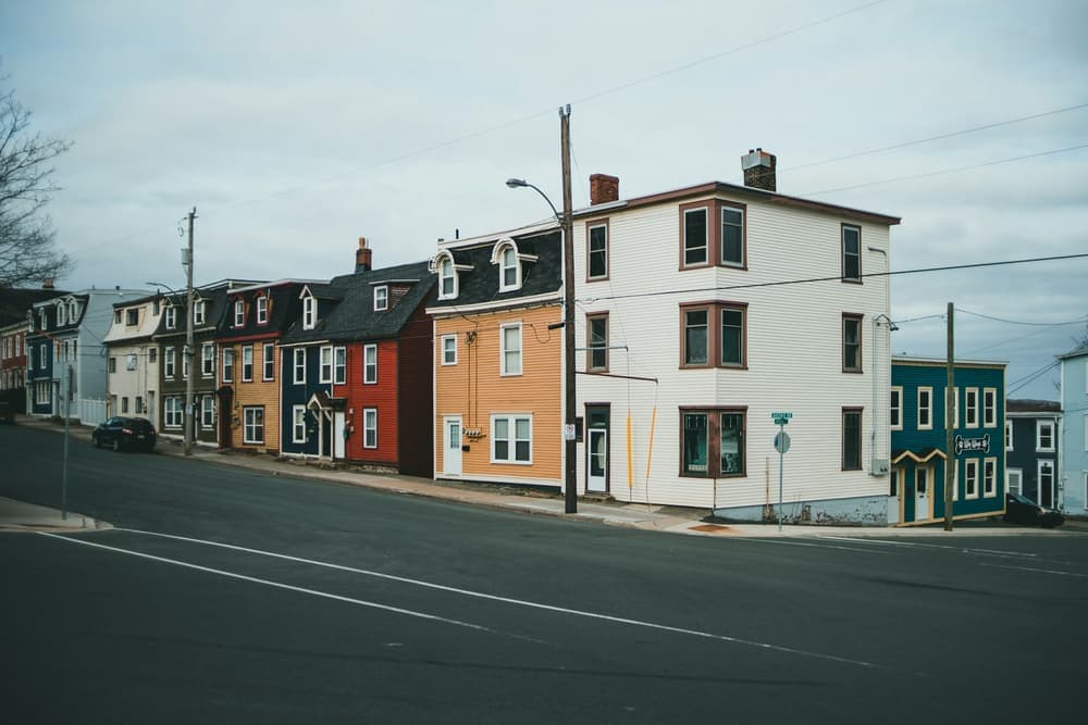 A street of colourful row houses
